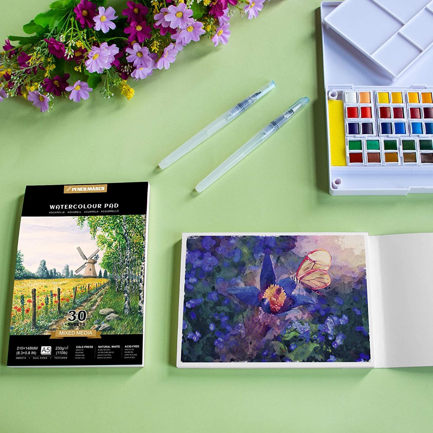 An A5 Pencilmarch watercolour paper pad with 230 gsm paper and 30 pages next to a painting - Stationery Island