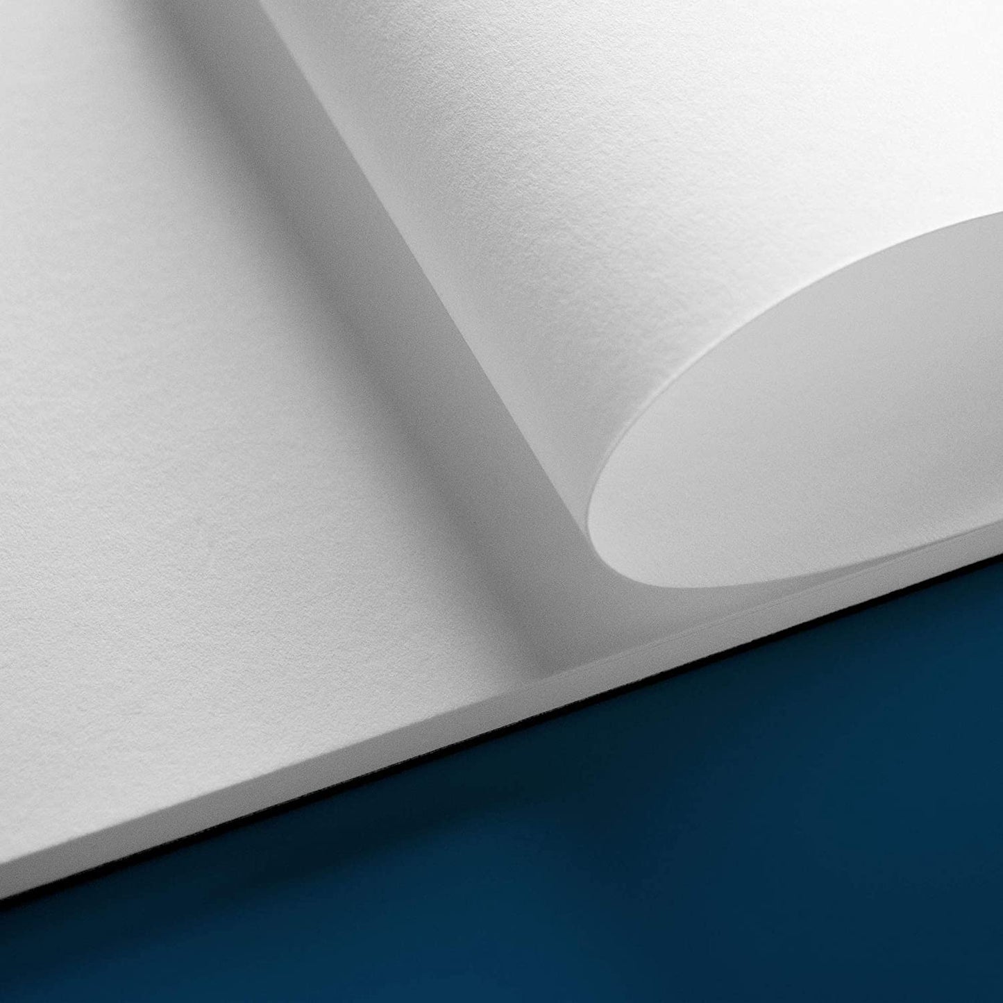 Paper being rolled over in the A4 Pencilmarch artist watercolour paper pad with 300 gsm paper and 30 pages - Stationery Island