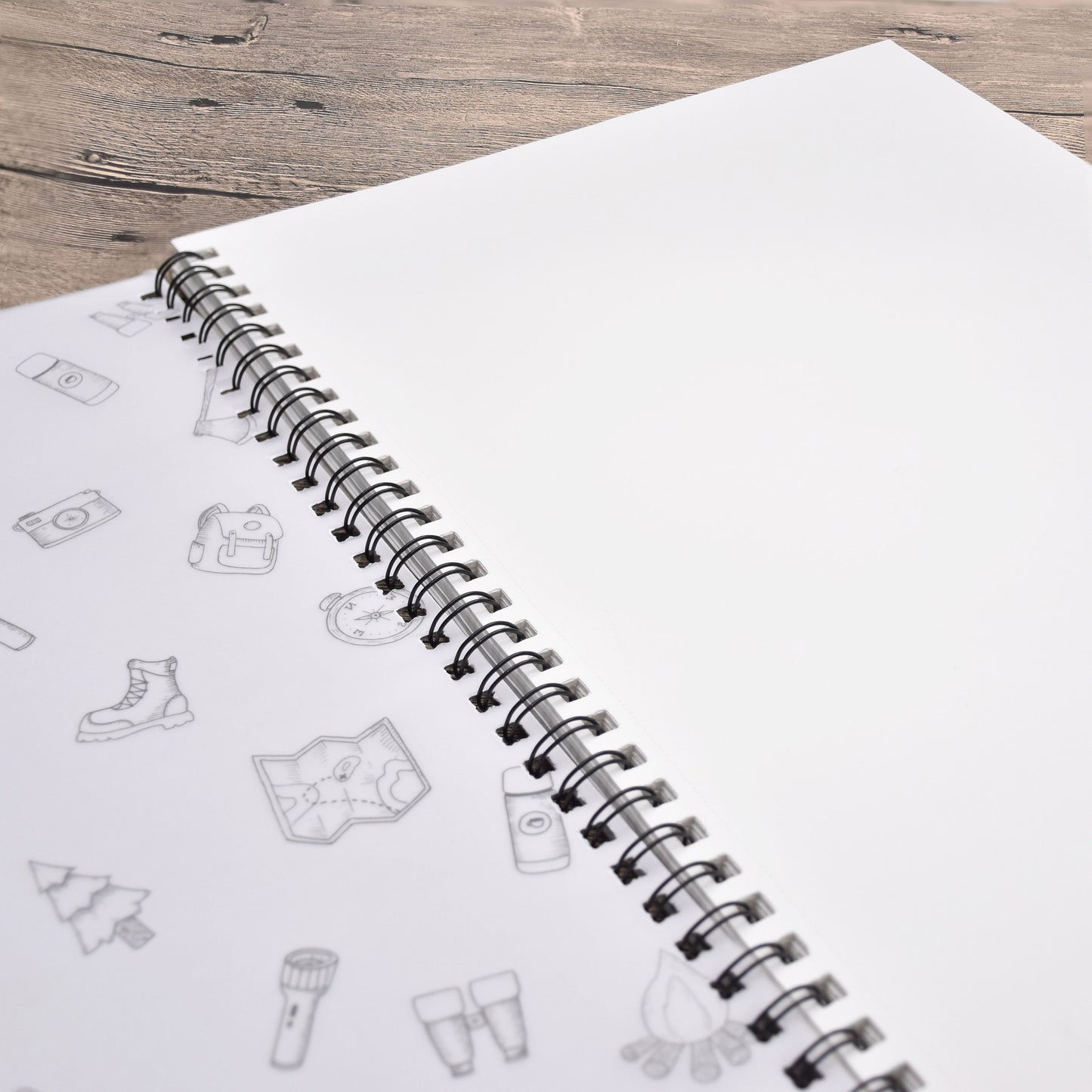 An opened A3 spiral bound sketchbook, which is included in the pack of 2 A3 spiral bound sketchbooks - Stationery Island
