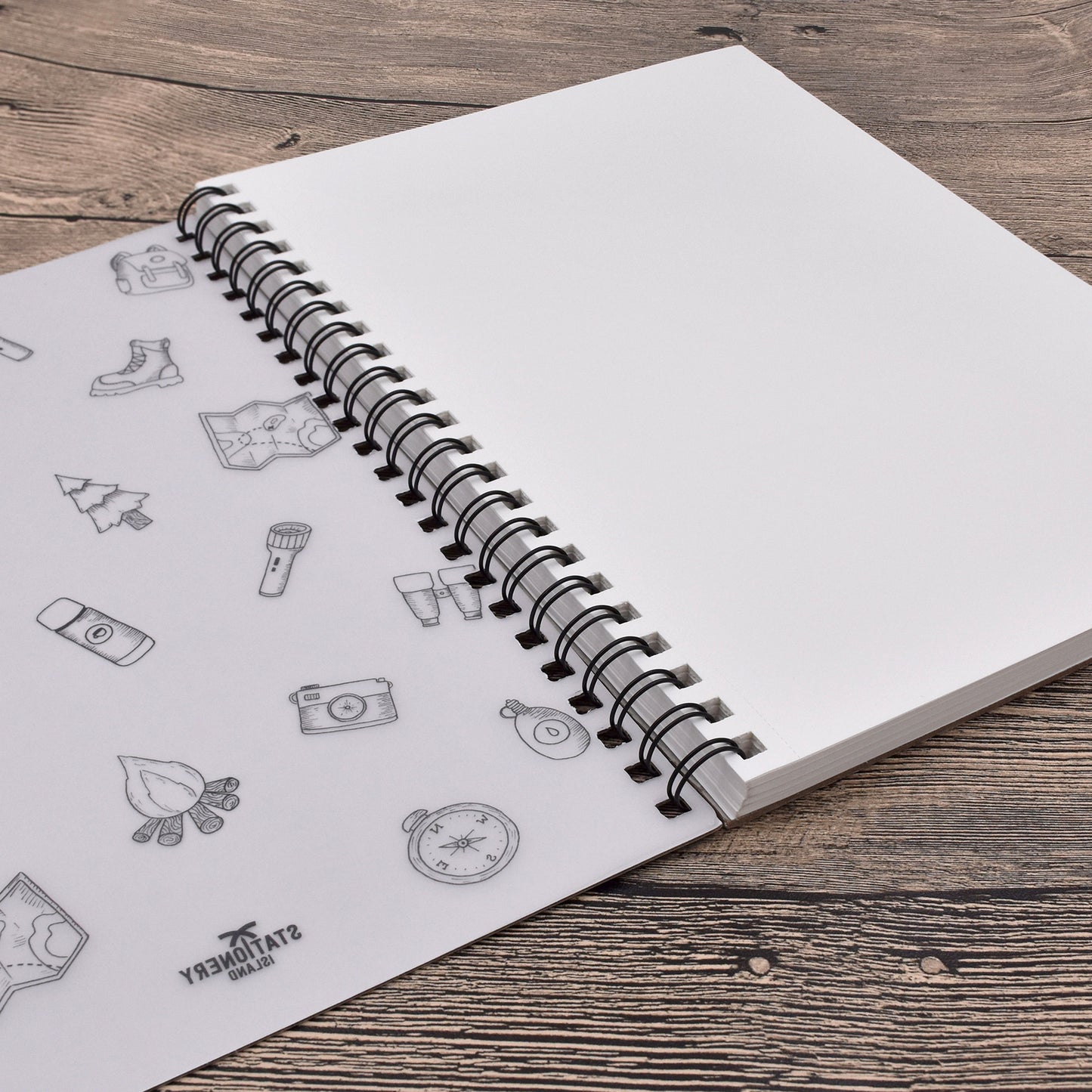 An opened A4 spiral bound sketchbook, which is included in the pack of 2 A4 spiral bound sketchbooks - Stationery Island