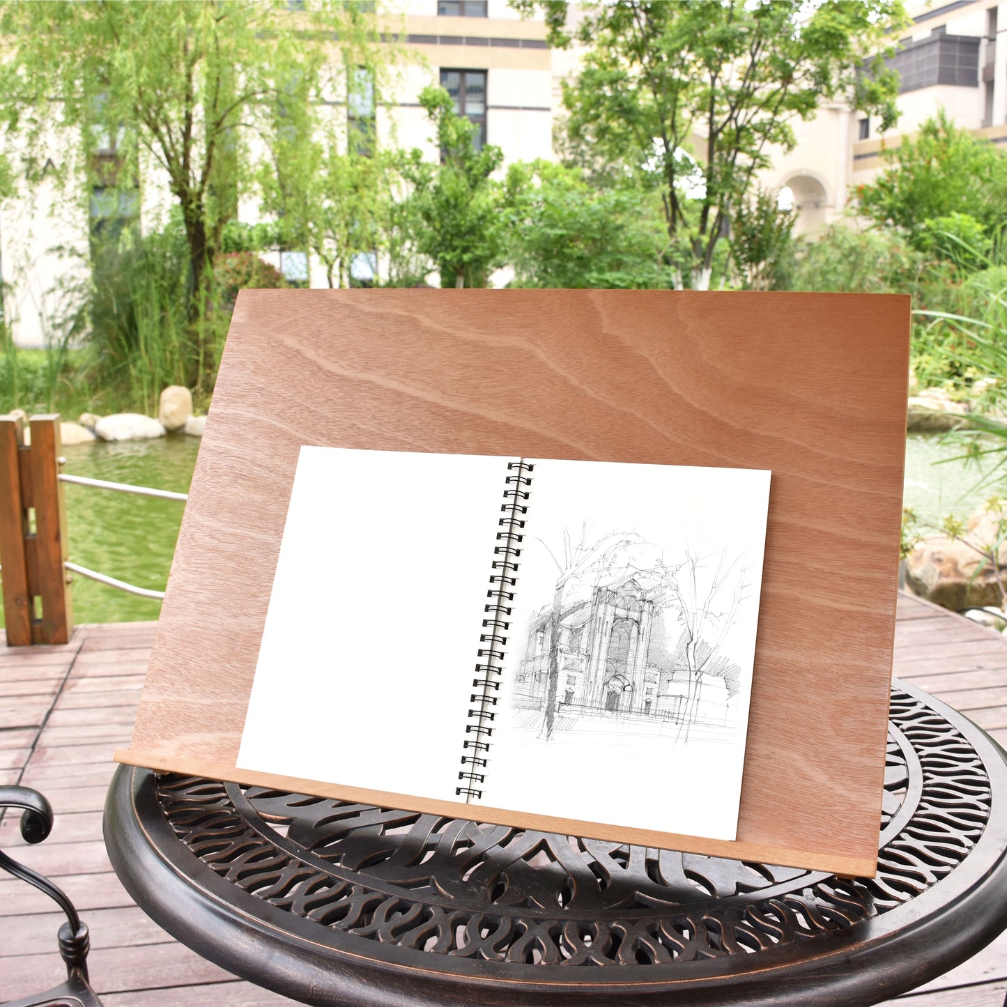 A house being sketched inside one of the sketchbooks that is included in the pack of 2 A4 spiral bound sketchbooks - Stationery Island
