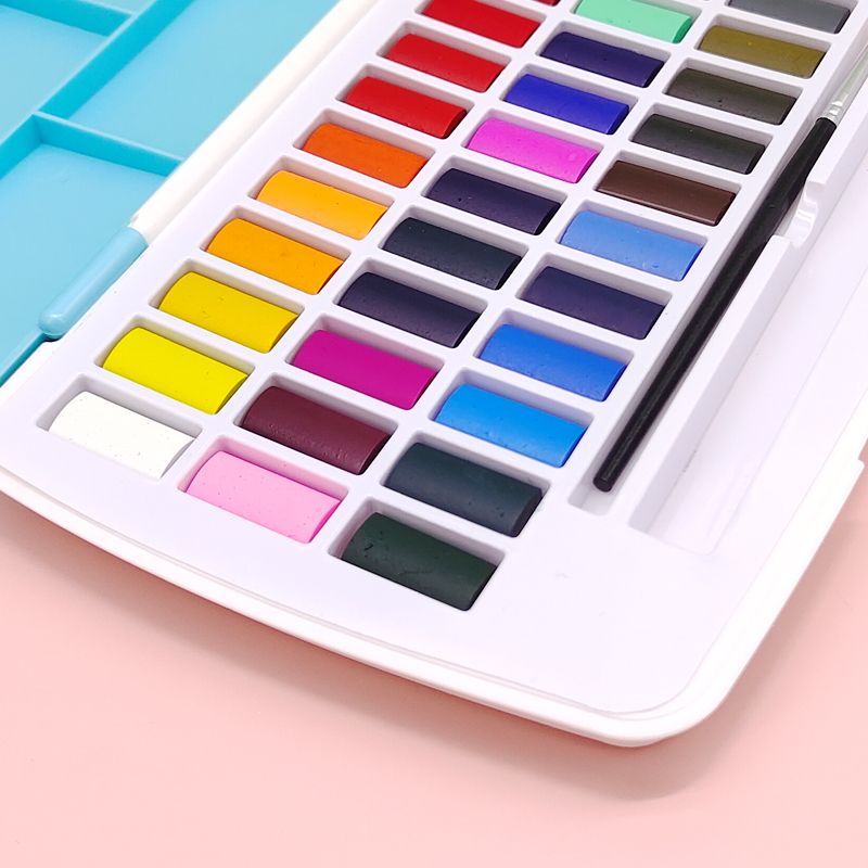 A TBC watercolour paint set with 36 colours, which includes a paintbrush, a refillable water-brush pen and a dabbing sponge - Stationery Island
