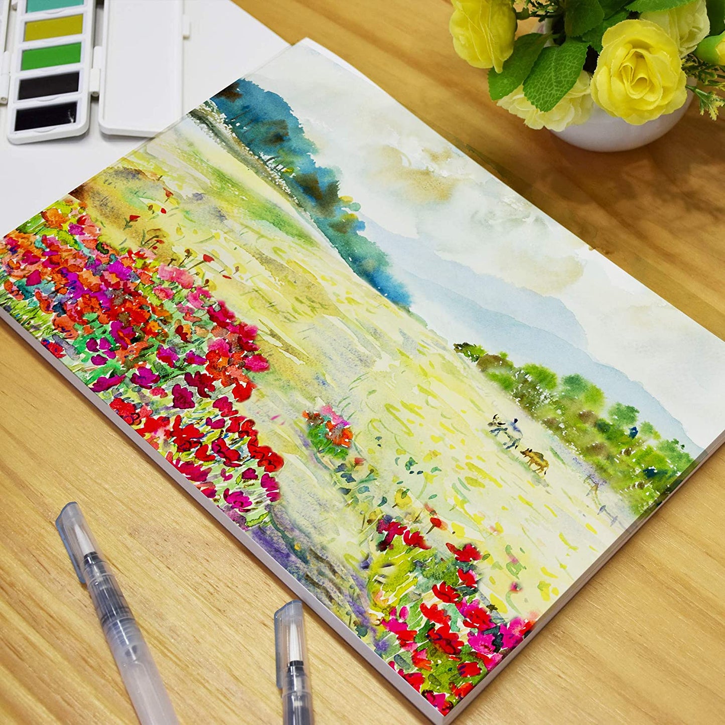 A picture of a field painted on an A4 Pencilmarch student watercolour paper pad with 300 gsm paper and 30 pages - Stationery Island